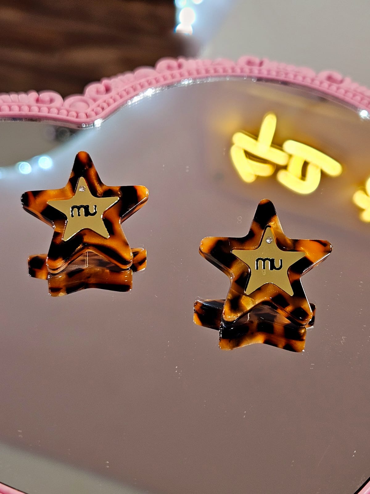 Aretes Mu